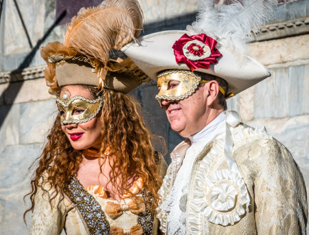 Venice, Italy - February 23: Participants of the Venice Carnival pose to the audience during the famous Carnival on February 23, 2019 in Venice, italyのeditorial素材
