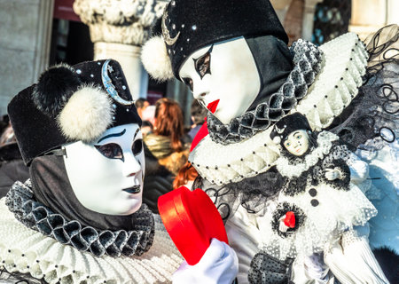 Venice, Italy - February 23: Participants of the Venice Carnival pose to the audience during the famous Carnival on February 23, 2019 in Venice, italyのeditorial素材