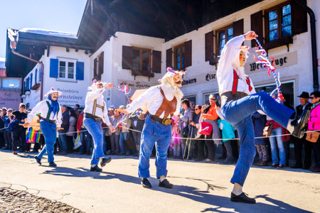 Mittenwald, Germany - February 28: Machkera is a traditional disguise with large wooden larvae, here shown at a parade on Feb 28, 2019 in Mittenwald, Germanyのeditorial素材