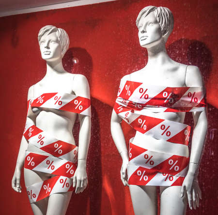 mannequin with sale tape - photoの写真素材