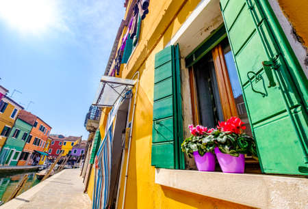 famous old town of the village burano in italy near veniceの写真素材