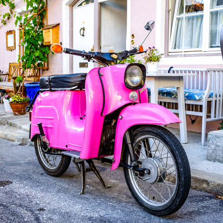 Parma, Italy - May 29: typical old Schwalbe small motorbike at the old town on May 29, 2017 in Parma, Italyのeditorial素材