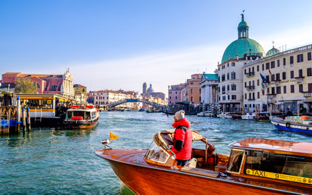 Venice, Italy - March 15: typical traffic with boats on the waterways and canals in venice, italy on March 15, 2019のeditorial素材
