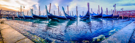 typical famous gondolas in venice - italyの写真素材