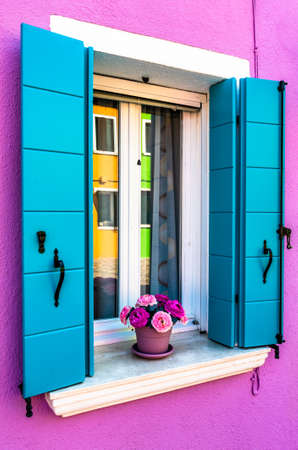 famous old town of the village burano in italy near veniceの写真素材