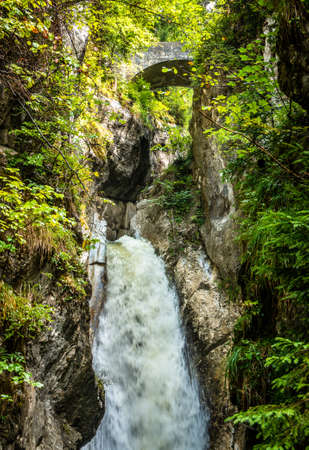 nice small waterfall at a forestの写真素材