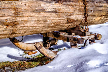 old transport sled with treesの写真素材