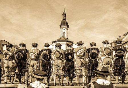 Traunstein, Germany - April 22: participants at the traditional sworddance while the famous annual georgiritt-pageant in the old town of traunstein at April 22, 2019のeditorial素材
