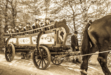 Bad Toelz, Germany - November 6: people with traditional clothes at the annual horse-carriage procession with blessing, named leonhardifahrt on November 6, 2018 in bad toelz, germanyのeditorial素材