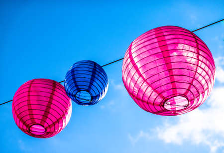 lanterns in front of blue sky - space for textの写真素材