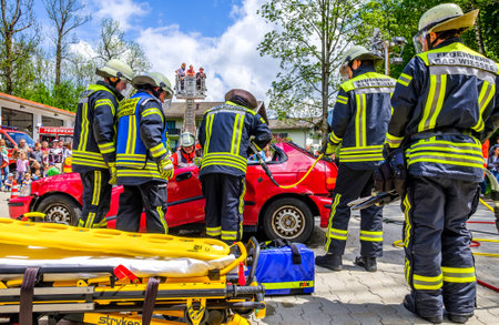 Bad Wiessee - Germany, May 26: public car accident exercise of the volunteer fire department and the...