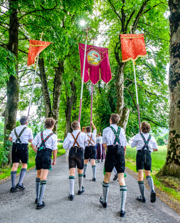 Benediktbeuern, Germany - June 20:  participants at a famous traditional bavarian corpus christi procession in Benediktbeuern on june 20, 2019のeditorial素材