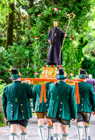 Benediktbeuern, Germany - June 20:  participants at a famous traditional bavarian corpus christi procession in Benediktbeuern on june 20, 2019のeditorial素材