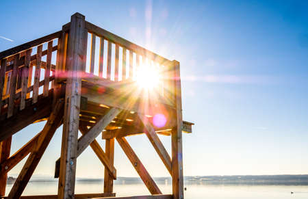 wooden diving platform at a lakeの写真素材