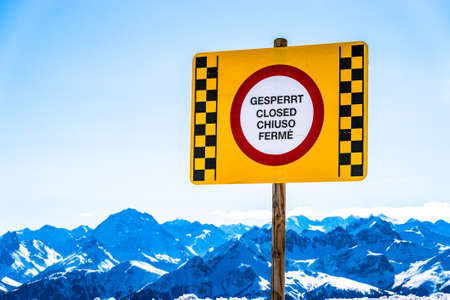 closed sign at the european alps - translation: way closedの写真素材