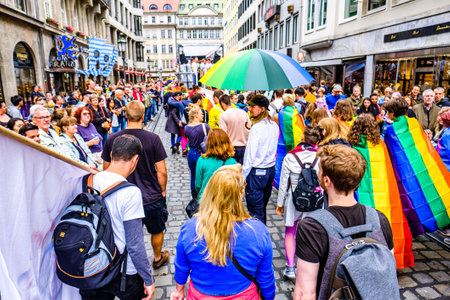 Munich, Germany - July 13: Participants and spectators at the 50th anniversary of stonewall christopher street day parade in munich on July 13, 2019のeditorial素材