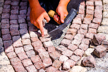 paving cobblestone at a backyardの写真素材