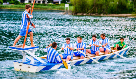 Rottach-Egern, Germany - July 9: Bavarian competition of two groups with rowboats at a summer festival called Fishermen Joust in Rottach-Egern on July 9, 2019のeditorial素材