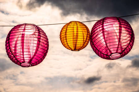 lanterns in front of blue sky - space for textの写真素材