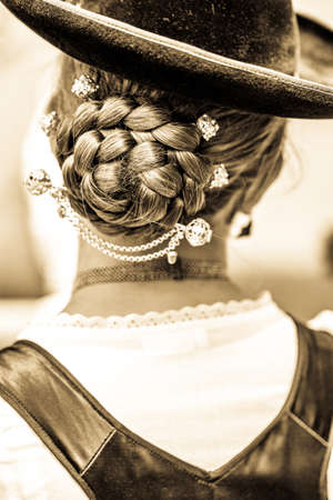 typical bavarian traditonal clothes and hair style