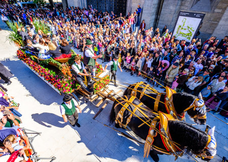 Munich, Germany - September 21: Participants, carts, marching bands of the annual opening parade called "einzug der wirte" of the oktoberfest on september 21, 2019 in the old town of munichのeditorial素材