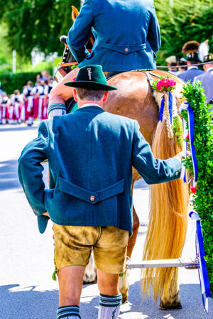 Bad Heilbrunn, Germany - July 14: participants of a typical pageant with traditional clothes in Bad Heilbrunn on July 14, 2019のeditorial素材