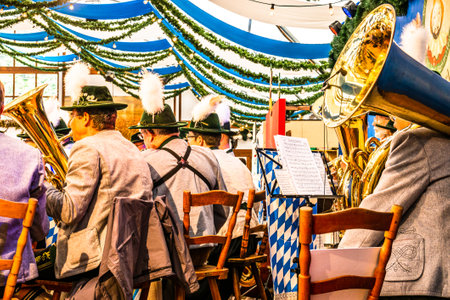 Munich, Germany - October 2: typcial brass musician at the oktoberfest in munich on October 2, 2018のeditorial素材