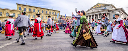 Munich, Germany - September 22: Participants, marching bands and carts at the annual opening parade of the oktoberfest on september 22, 2019 in the old town of munichのeditorial素材