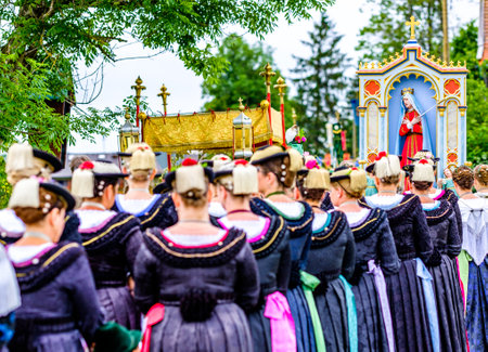 Wackersberg, Germany - June 23: Participants in traditional clothes at the Corpus Christi procession at June 23, 2019 in Bad Toelz - Germany.のeditorial素材