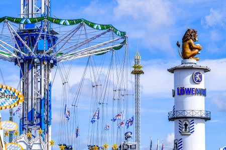 munich, Germany - September 24: the oktoberfest - chain carousel and people at the world greatest annual fair on september 24, 2019 in munichのeditorial素材