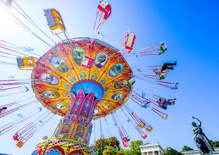 munich, Germany - September 21: the oktoberfest - carousels and people at the world greatest annual fair on september 21, 2019 in munichのeditorial素材