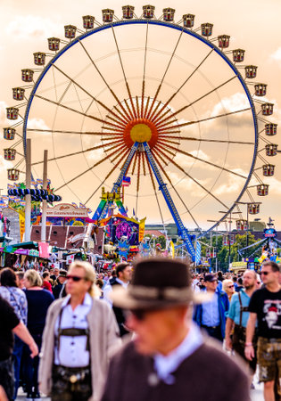 munich, Germany - September 24: the oktoberfest - carousels and people at the world greatest annual fair on september 24, 2019 in munichのeditorial素材