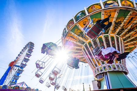 munich, Germany - September 24: the oktoberfest - chain carousel and people at the world greatest annual fair on september 24, 2019 in munichのeditorial素材