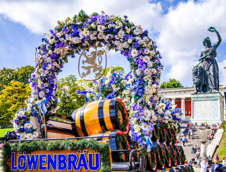 munich, Germany - September 24: the oktoberfest - famous lowenbrau cart with horses at the world greatest annual fair on september 24, 2019 in munichのeditorial素材