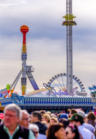 munich, Germany - September 24: the oktoberfest - carousels and people at the world greatest annual fair on september 24, 2019 in munichのeditorial素材