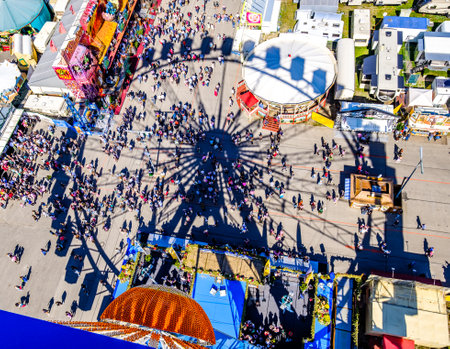 munich, Germany - September 21: the oktoberfest - carousels and people at the world greatest annual fair on september 21, 2019 in munichのeditorial素材