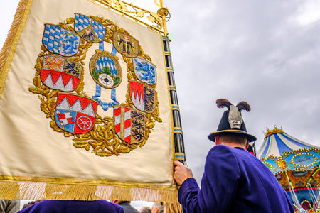 Munich, Germany - October 2019: The traditional marksmen parade with brass bands on the last day of the Oktoberfest. 60 shooters shoot a salute at the foot of the Bavaria statue on October 6, 2019 in Munichのeditorial素材