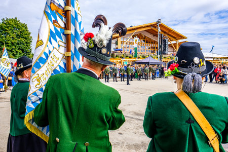 Munich, Germany - October 2019: The traditional marksmen parade with brass bands on the last day of the Oktoberfest. 60 shooters shoot a salute at the foot of the Bavaria statue on October 6, 2019 in Munichのeditorial素材