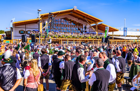 Munich, Germany - September 29: participants and musicians at the traditional open-air concert on the oktoberfest in munich at September 29, 2019のeditorial素材