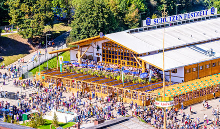 Munich, Germany - September 29: visitors, beertents and fairground rides on the oktoberfest in munich at September 29, 2019のeditorial素材