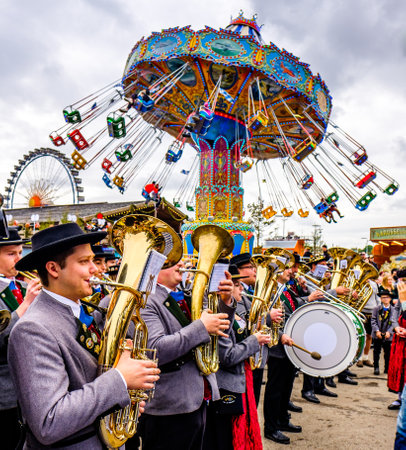 Munich, Germany - October 2019: The traditional marksmen parade with brass bands on the last day of the Oktoberfest. 60 shooters shoot a salute at the foot of the Bavaria statue on October 6, 2019 in Munichのeditorial素材