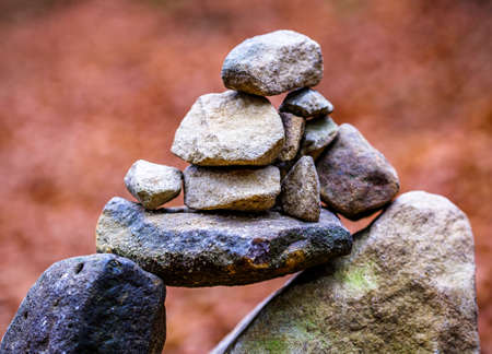 stacked rocks at a forestの写真素材