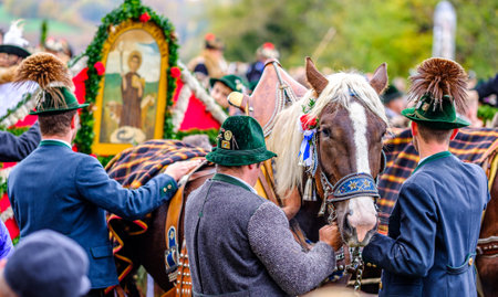 Bad Toelz, Germany - November 6: people with traditional clothes at the annual horse-carriage procession with blessing, named leonhardifahrt on November 6, 2019 in bad toelz, germanyのeditorial素材