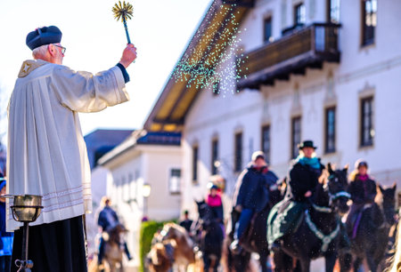 Lenggries, Germany - November 10: people with traditional clothes at the annual horse-carriage procession with blessing, named leonhardifahrt on November 10, 2019 in Lenggries, germanyのeditorial素材