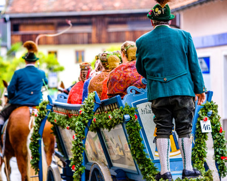 Bad Toelz, Germany - November 6: people with traditional clothes at the annual horse-carriage procession with blessing, named leonhardifahrt on November 6, 2019 in bad toelz, germanyのeditorial素材