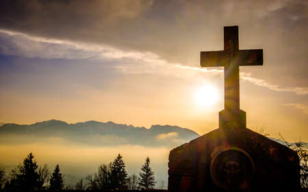 old cross at a cemeteryの写真素材