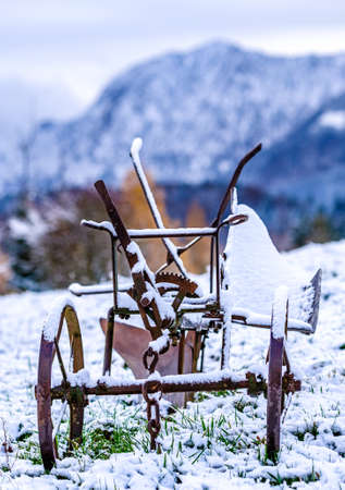 old antique harrow at a fieldの写真素材