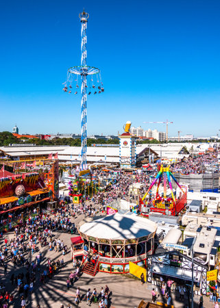 munich, Germany - September 21: the oktoberfest - carousels and people at the world greatest annual fair on september 21, 2019 in munichのeditorial素材
