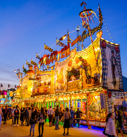 Munich, Germany - September 28: visitors, beertents and fairground rides on the oktoberfest in munich at September 28, 2019のeditorial素材