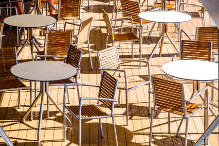 table and chairs at a cafe in viennaの写真素材